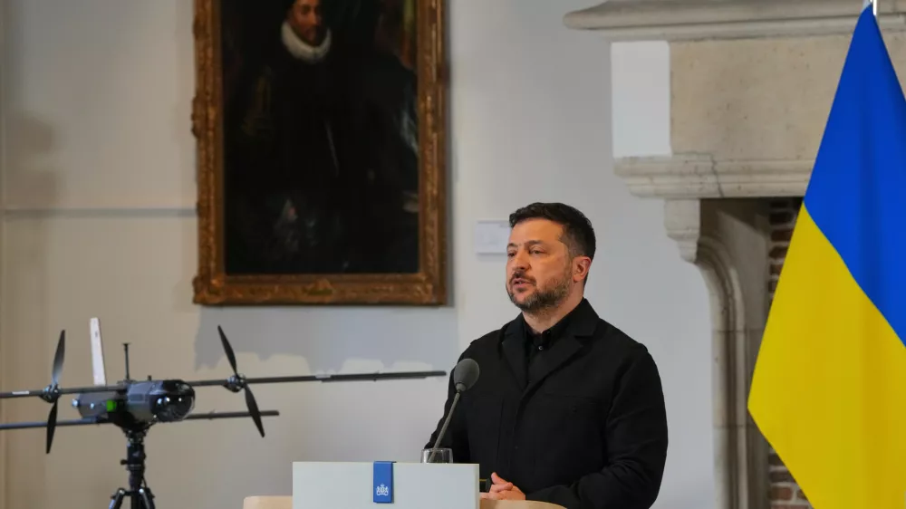 Ukraine's President Volodymyr Zelenskyy speaks next to a drone after he received the International Four Freedoms Award, in Middelburg, Netherlands, Thursday, April 16, 2026. (AP Photo/Peter Dejong)