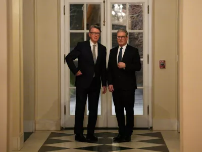 FILE PHOTO: British Prime Minister Keir Starmer talks with Britain's ambassador to the United States Peter Mandelson during a welcome reception at the ambassador's residence on February 26, 2025, in Washington, DC, U.S. Carl Court/Pool via REUTERS/File Photo