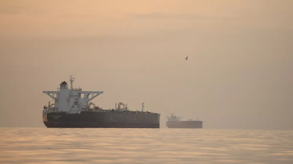 Tankers anchored in the Strait of Hormuz off the coast of Qeshm Island, Iran, Saturday, April 18, 2026. (AP Photo/Asghar Besharati)