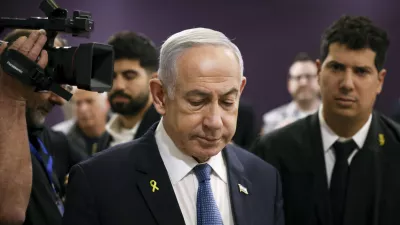 FILE - Israeli Prime Minister Benjamin Netanyahu attends his trial where he faces corruption charges at the district court in Tel Aviv, Israel, Dec. 16, 2024. (Stoyan Nenov/Pool Photo via AP, File)