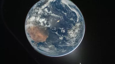 This image provided by NASA shows a view of Earth taken by NASA astronaut and Artemis II Commander Reid Wiseman from of the Orion spacecraft's window after completing the translunar injection burn on April 2, 2026. (NASA via AP)