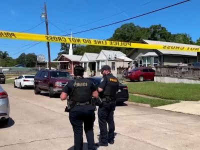 Police officers secure a street where eight children, with ages ranging from 1 to 14, were killed in a mass shooting in Shreveport, Louisiana, U.S. April 19, 2026, in a still image from video. ABC Affiliate KTBS via REUTERS/Handout via REUTERS  THIS IMAGE HAS BEEN SUPPLIED BY A THIRD PARTY. NO RESALES. NO ARCHIVES.