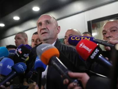 Former Bulgarian President Rumen Radev speaks to journalists after the polls closed in Sunday's election, in Sofia, Bulgaria, April 19, 2026. (AP Photo/Valentina Petrova)