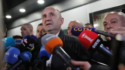 Former Bulgarian President Rumen Radev speaks to journalists after the polls closed in Sunday's election, in Sofia, Bulgaria, April 19, 2026. (AP Photo/Valentina Petrova)