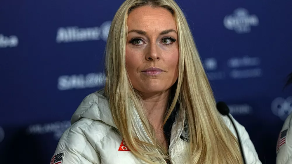 United States' Lindsey Vonn attends a press conference by the U.S. ski team at the 2026 Winter Olympics, in Cortina d'Ampezzo, Italy, Tuesday, Feb. 3, 2026. (AP Photo/Fatima Shbair)