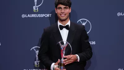 Carlos Alcaraz poses with his Laureus World Sportsman of the Year award during the 2026 Laureus World Sports Awards ceremony in Madrid, Spain, Monday, April 20, 2026. (AP Photo/Manu Fernandez)