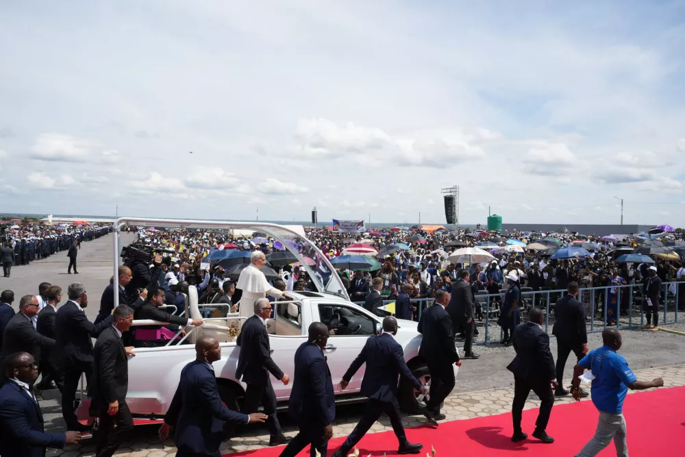 Pope Leo XIV is cheered by faithful as he arrives to celebrate a mass at Saurimo esplanade, Angola, Monday, April 20, 2026. (AP Photo/Andrew Medichini)