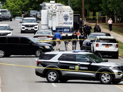 Winston-Salem police have a mobile command unit set up at the scene of a shooting at Leinbach Park, Monday, April 20, 2026, in Winston-Salem, N.C. (Allison Lee Isley/The Winston-Salem Journal via AP)