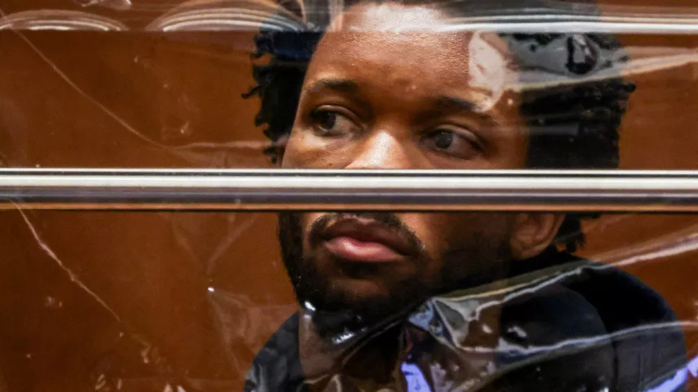 Singer David Anthony Burke, known as D4vd, looks on during his arraignment for the murder of Celeste Rivas Hernandez at the Clara Shortridge Foltz Criminal Justice Center in Los Angeles, California, U.S., April 20, 2026. Los Angeles County District Attorney Nathan J. Hochman announced earlier in the day that musician David Anthony Burke, known as D4vd, was charged today with murdering 14-year-old Celeste Rivas Hernandez, whose body was found decomposed and dismembered in his car that had been impounded in September 2025.  TED SOQUI/Pool via REUTERS