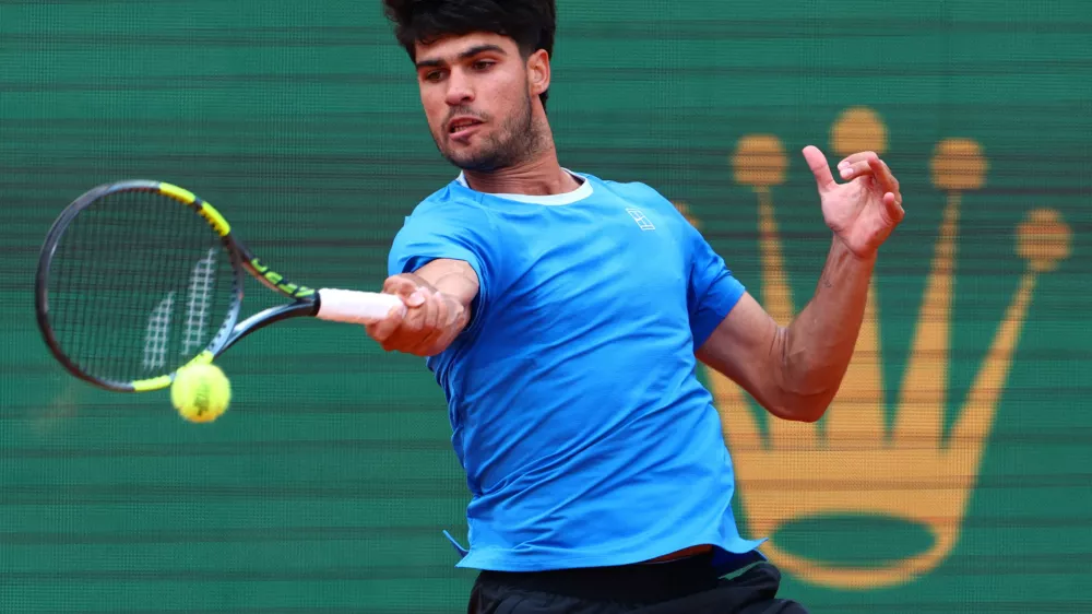 FILE PHOTO: Tennis - ATP Masters 1000 - Monte Carlo Masters - Monte Carlo Country Club, Roquebrune-Cap-Martin, France - April 12, 2026 Spain's Carlos Alcaraz in action during his final match against Italy's Jannik Sinner REUTERS/Manon Cruz/File Photo