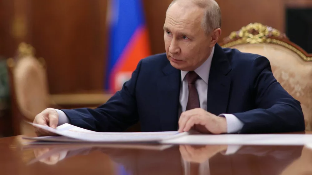 Russian President Vladimir Putin attends a meeting with Governor of the Penza region Oleg Melnichenko in Moscow, Russia, April 20, 2026. Sputnik/Alexander Kazakov/Pool via REUTERS ATTENTION EDITORS - THIS IMAGE WAS PROVIDED BY A THIRD PARTY.