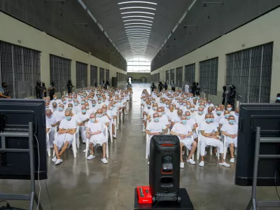 Members of Mara Salvatrucha, also known as MS-13 gang, attend an open hearing by El Salvador prosecutors against 486 members of the gang, who are accused of more than 47,000 crimes committed between 2012 and 2022, according to a statement from the Attorney General's Office, at the Terrorism Confinement Center (CECOT) in Tecoluca, El Salvador, April 20, 2026. Attorney General's Office of El Salvador/Handout via REUTERS ATTENTION EDITORS - THIS IMAGE HAS BEEN SUPPLIED BY A THIRD PARTY. NO RESALES. NO ARCHIVES.