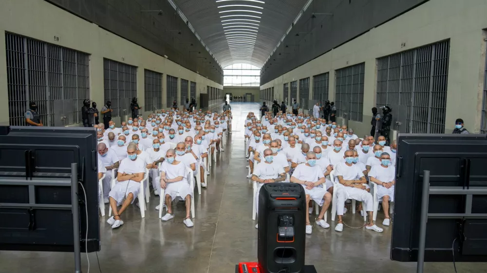 Members of Mara Salvatrucha, also known as MS-13 gang, attend an open hearing by El Salvador prosecutors against 486 members of the gang, who are accused of more than 47,000 crimes committed between 2012 and 2022, according to a statement from the Attorney General's Office, at the Terrorism Confinement Center (CECOT) in Tecoluca, El Salvador, April 20, 2026. Attorney General's Office of El Salvador/Handout via REUTERS ATTENTION EDITORS - THIS IMAGE HAS BEEN SUPPLIED BY A THIRD PARTY. NO RESALES. NO ARCHIVES.