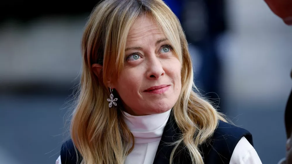 Italian Prime Minister Giorgia Meloni reacts as she waits for the arrival of Kenya's President William Ruto at Chigi Palace, in Rome, Italy, April 20, 2026. REUTERS/Remo Casilli
