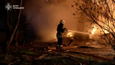A firefighter works at a site of Russian strikes, amid Russia's attack on Ukraine, in Sumy, Ukraine, in this screen grab taken from a handout video released on April 21, 2026.   State Emergency Service Of Ukraine In Sumy Region/Handout via REUTERS  THIS IMAGE HAS BEEN SUPPLIED BY A THIRD PARTY. MANDATORY CREDIT. OVERLAYS FROM SOURCE. Verification:- - Building facades, windows and benches matched file images and corroborating images from police - Date not verified but no older version of the video was found posted online before April 21, 2026 - Sumy region governor Oleh Hryhorov confirmed in a statement posted on April 21 that 15 people were wounded in the night attack in Sumy