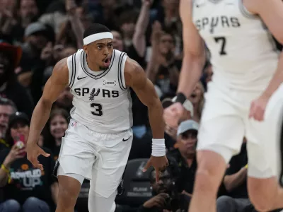 San Antonio Spurs forward Keldon Johnson (3) reacts after scoring against the Portland Trail Blazers during the first half in Game 2 of a first-round NBA playoffs basketball series in San Antonio, Tuesday, April 21, 2026. (AP Photo/Eric Gay)