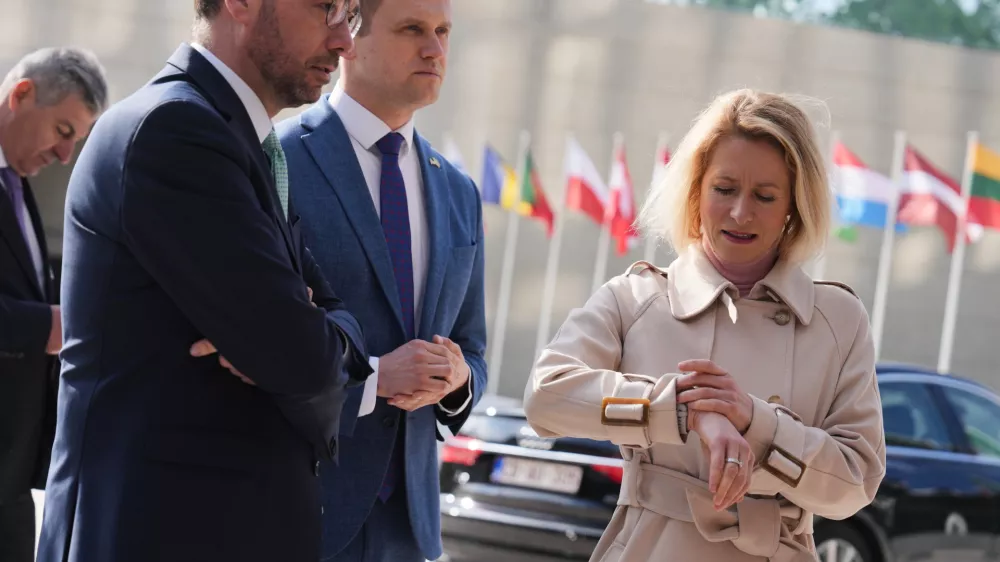 European Union foreign policy chief Kaja Kallas, right, looks at her watch as she arrives for a meeting of EU foreign ministers at the European Council building in Luxembourg, Tuesday, April 21, 2026. (AP Photo/Virginia Mayo)