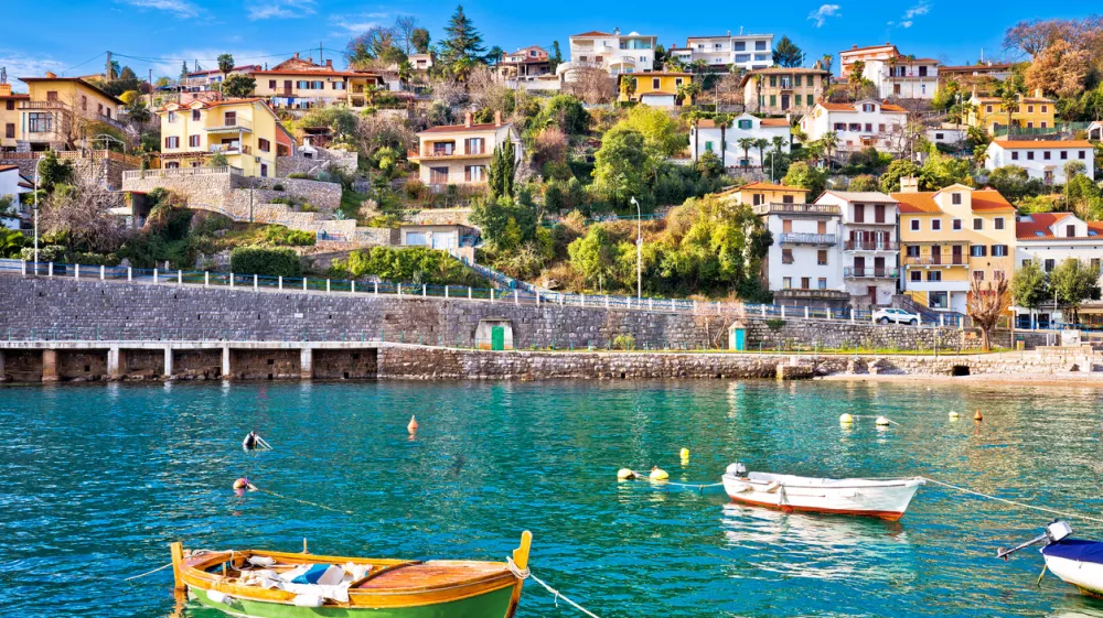 Ika village waterfront in Opatija riviera, turquoise sea and blue sky, Kvarner, Croatia