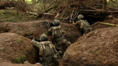 Ukrainian soldiers take part in a final tactical exercise on the fourth anniversary of Russia's full-scale invasion of Ukraine, held at a British Army training camp in East Anglia, Britain, February 24, 2026. REUTERS/Chris Radburn