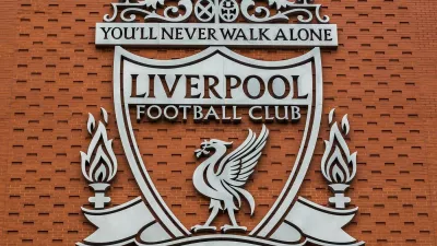 One of the two giant silver crests of Liverpool FC pictured on the new main stand. This crest has been used by the club since 1999 & features the Liver Bird, the Shankly Gates & two eternal flames to remember the victims of the Hillsborough disaster.,Image: 312909563, License: Royalty-free, Restrictions:, Model Release: no