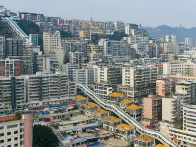 Wushan,China.14th January 2026. The aerial photos captured the soon-to-be-operational Goddess Escalator (Shenn&uuml; Da Futi) located in Wushan County, southwest China's Chongqing Municipality, January 14, 2026. The Goddess Escalator project is built along the existing north-south urban central axis of Shenn&uuml; Avenue. It is a multi-level electric escalator system designed as a key vertical transit corridor for the city, with a total longitudinal length of approximately 905 meters, surpassing the Chongqing Crown Escalator. The total vertical lift height is over 240 meters, equivalent to the height of an 80-story building. The project includes 21 escalators, 8 elevators (including barrier-free bridge elevators), 4 moving walkways, 2 pedestrian footbridges, and 2 crossover passages. Once operational, travel time along the upper and lower sections of Shenn&uuml; Avenue will be reduced from nearly one hour to about 20 minutes, significantly facilitating daily commuting for residents and sightseeing for tourists. Credit: He Penglei/China News Service/Alamy Live News,Image: 1066197235, License: Rights-managed, Restrictions: Usage restrictions: Advertising and promotion,Commercial electronic,Consumer goods,Direct mail and brochures,Indoor display,Internal business usage,Personal use, Model Release: no