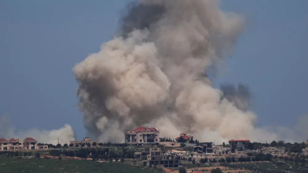 Smoke rises in Lebanon after an explosion, as seen from the Israeli side of the Israel-Lebanon border, in northern Israel, April 25, 2026. REUTERS/Florion Goga