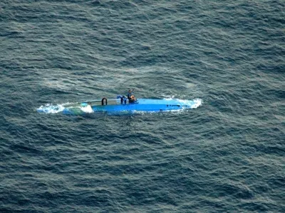 This image provided by the US Navy shows a self-propelled semi-submersible vessel off the coast of Central America in the eastern Pacific, Sunday, Aug 19. 2007. Coast Guard officials intercepted the vessel and detained the smugglers, who were transporting approximately 5.5 tons of cocaine worth 2 million. (AP Photo/US Navy)