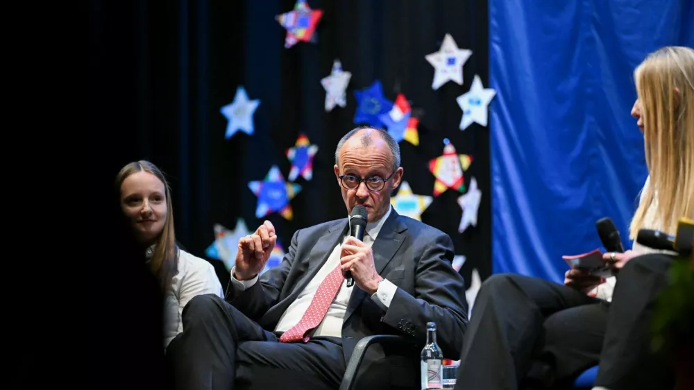German Chancellor Friedrich Merz speaks during a panel discussion with students during his visit to the Carolus-Magnus-Gymnasium, as part of the EU Project Day in Schools, in Marsberg, Germany, April 27, 2026. REUTERS/Teresa Kroeger