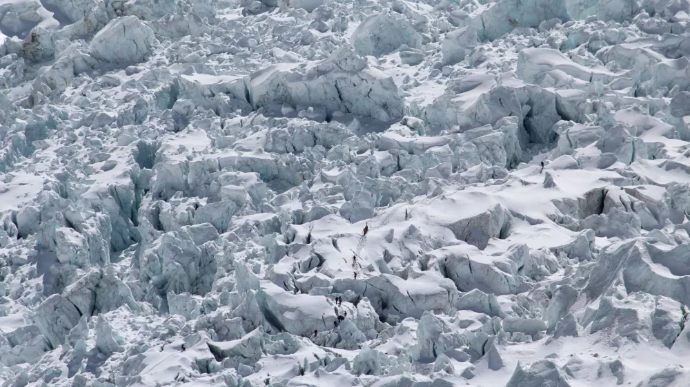 Apr 25, 2015 - Solo Khumba, Nepal - Climbers in the Khumbu Icefall. The scene after an avalanche triggered by a massive earthquake swept across Everest Base Camp, Nepal on Saturday April 25, 2015. Mountain guides and climbers stand beside camping and climbing gear gathered together after the avalanche hit, boots and camping gear lay strewn about at Everest Base Camp, Nepal. (Credit Image: ? P. Tu Sherpa/M. Bogati/ZUMA Wire)