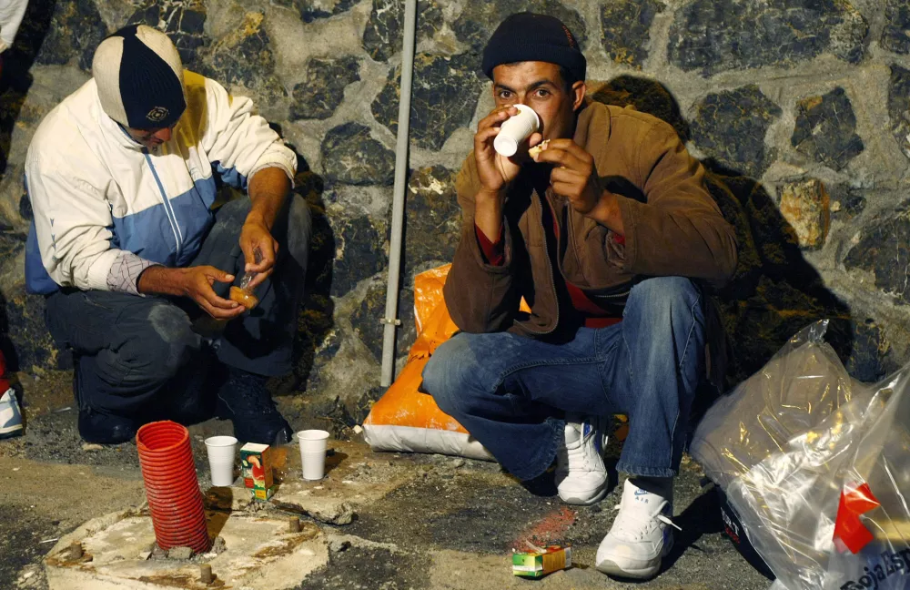 Would-be immigrants rest at the port of Almeria September 24, 2007 after they were intercepted off the southern Spanish coast on their way to reach European soil from Africa. REUTERS/Francisco Bonilla  (SPAIN)