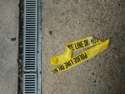 Police tape lies on the street outside the Washington Hilton hotel, where a shooting incident occurred yesterday night at the annual White House Correspondents' Association dinner, in Washington, D.C., U.S., April 26, 2026. REUTERS/Kylie Cooper