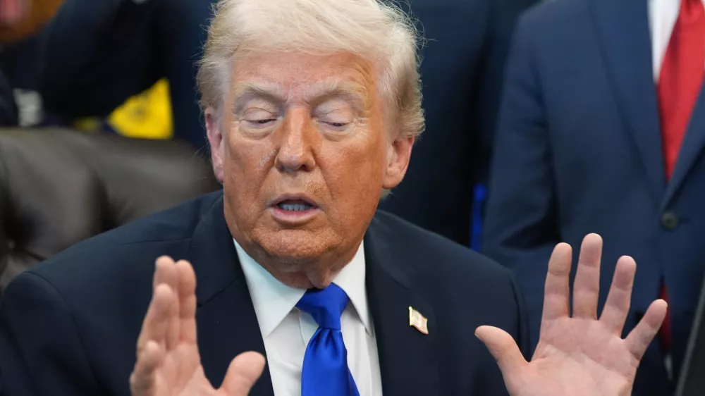 President Donald Trump speaks to reporters in the Oval Office of the White House, Thursday, April 30, 2026, in Washington. (AP Photo/Alex Brandon)