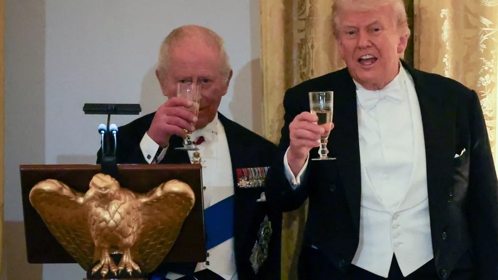FILE PHOTO: Britain's King Charles and U.S. President Donald Trump raise a toast during a state dinner for the King and Queen Camilla at the White House in Washington, D.C., U.S., April 28, 2026. REUTERS/Suzanne Plunkett/File Photo
