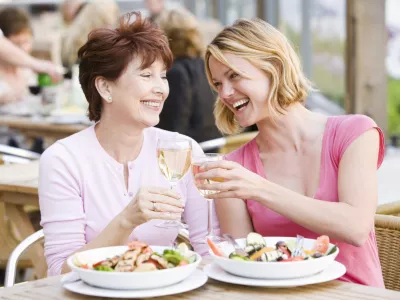 Mother and daughter at outdoor cafe