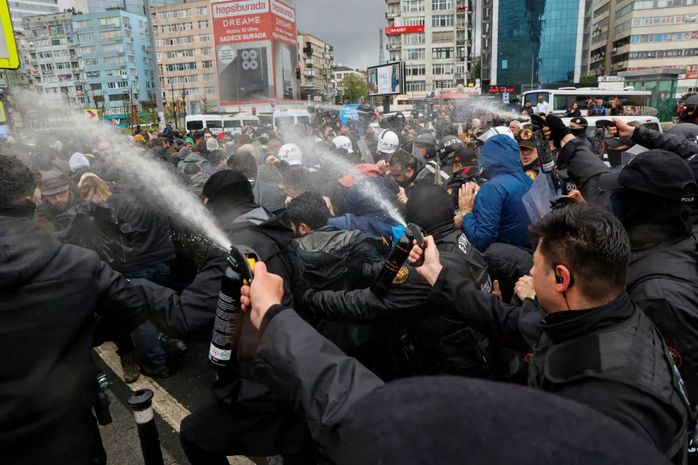 Police use pepper spray to disperse demonstrators, as people attempt to defy a ban and march on Taksim Square to celebrate May Day, in Istanbul, Turkey, May 1, 2026. REUTERS/Kemal Aslan