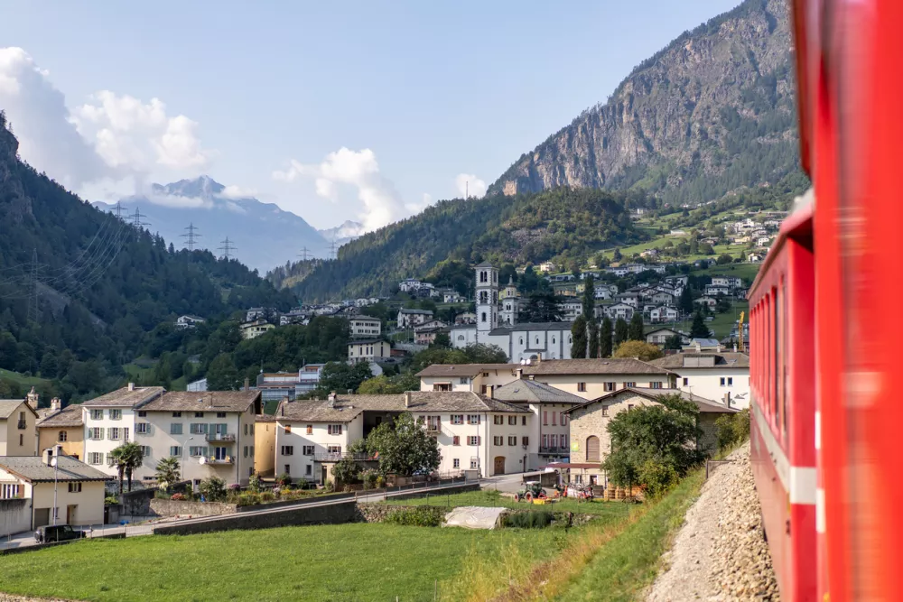 Brusio, Switzerland &ndash; September 13, 2020: The Rhaetian Railway (RhB) is a railroad in Switzerland in the canton of Grisons. The well-known Bernina Railway, which has been a UNESCO World Heritage Site since 2008, links the spa resort of St. Moritz over the Bernina Pass with the Italian town of Tirano.