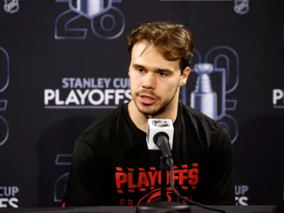 Carolina Hurricanes' Logan Stankoven speaks following Game 1 of an NHL hockey Stanley Cup second-round playoff series against the Philadelphia Flyers in Raleigh, N.C., Saturday, May 2, 2026. (AP Photo/Karl DeBlaker)