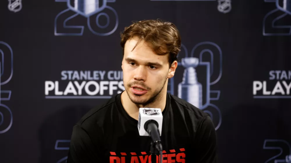 Carolina Hurricanes' Logan Stankoven speaks following Game 1 of an NHL hockey Stanley Cup second-round playoff series against the Philadelphia Flyers in Raleigh, N.C., Saturday, May 2, 2026. (AP Photo/Karl DeBlaker)