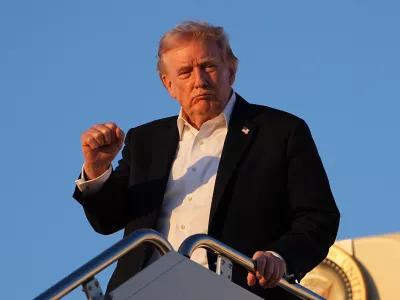 President Donald Trump arrives on Air Force One at Joint Base Andrews, Md., Sunday, May 3, 2026. (AP Photo/Matt Rourke)