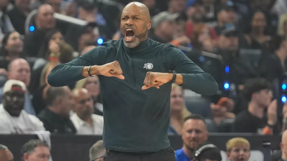 Orlando Magic head coach Jamahl Mosley directs his team against the Detroit Pistons during the first half in Game 6 of a first-round NBA basketball playoffs series, Friday, May 1, 2026, in Orlando, Fla. (AP Photo/John Raoux)