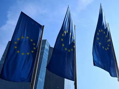 FILE PHOTO: European Union flags flutter outside the European Central Bank (ECB) headquarters in Frankfurt, Germany, March 19, 2026. REUTERS/Jana Rodenbusch/File Photo