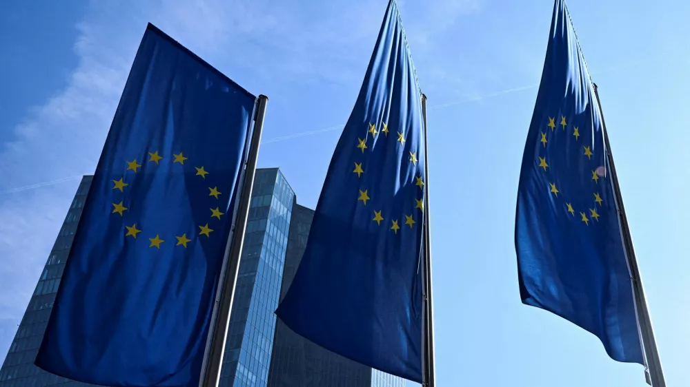 FILE PHOTO: European Union flags flutter outside the European Central Bank (ECB) headquarters in Frankfurt, Germany, March 19, 2026. REUTERS/Jana Rodenbusch/File Photo