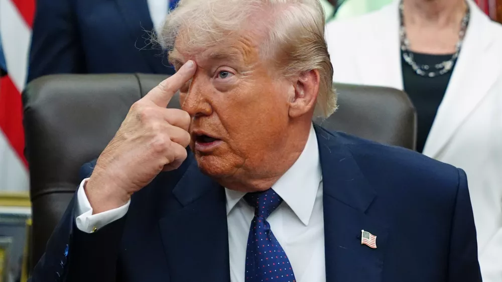 President Donald Trump speaks before signing a proclamation in the Oval Office at the White House, Tuesday, May 5, 2026, in Washington. (AP Photo/Jacquelyn Martin)