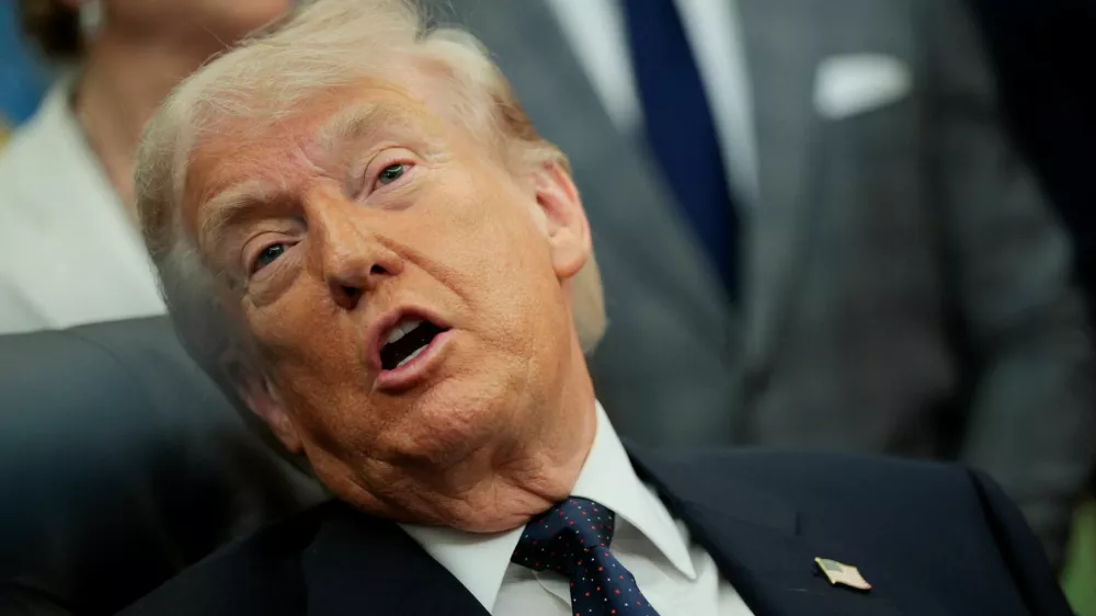 U.S. President Donald Trump speaks during an event to sign a memorandum in the Oval Office at the White House in Washington, D.C., U.S., May 5, 2026. REUTERS/Evan Vucci