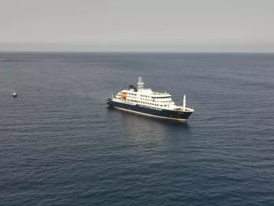 An aerial view of the MV Hondius Dutch cruise ship anchored in the Atlantic at Cape Verde, Tuesday, May 5, 2026. (AP Photo/Arilson Almeida)