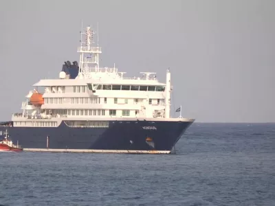 A boat beside cruise ship MV Hondius anchored off Cape Verde port, on the day sick passengers were evacuated by boat from the cruise ship, in Praia Port, Cape Verde, in this screengrab obtained from a video, May 5, 2026. REUTERS TV via REUTERS