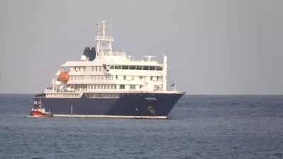 A boat beside cruise ship MV Hondius anchored off Cape Verde port, on the day sick passengers were evacuated by boat from the cruise ship, in Praia Port, Cape Verde, in this screengrab obtained from a video, May 5, 2026. REUTERS TV via REUTERS
