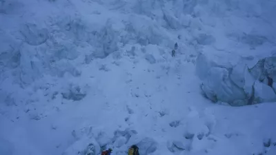 Members of an expedition team climb through the Khumbu Icefall during their rotation trip from Everest Base Camp to Camp 1 in the Solukhumbu district, also known as the Everest region, Nepal, May 3, 2026. REUTERS/Purnima Shrestha