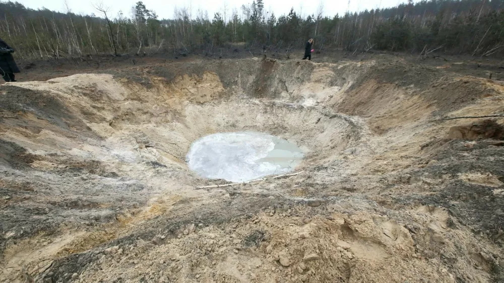 February 15, 2024, Kyiv Region, Ukraine: KYIV REGION, UKRAINE - FEBRUARY 15, 2024 - The crater left by the explosion of a downed Russian missile is pictured in Kyiv region, northern Ukraine. Early on February 15, Russia launched a massive missile attack on Ukraine. Ukrainian air defences intercepted 13 out of 26 missiles.,Image: 847123222, License: Rights-managed, Restrictions:, Model Release: no