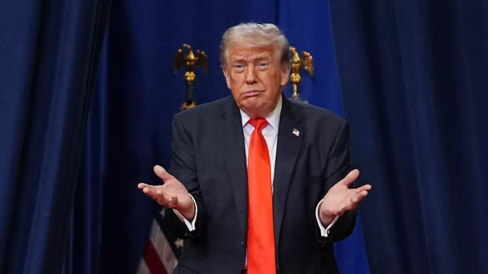 FILE - President Donald Trump arrives to speak at a charter school in The Villages, Florida., Friday, May 1, 2026. (AP Photo/Matt Rourke, File)